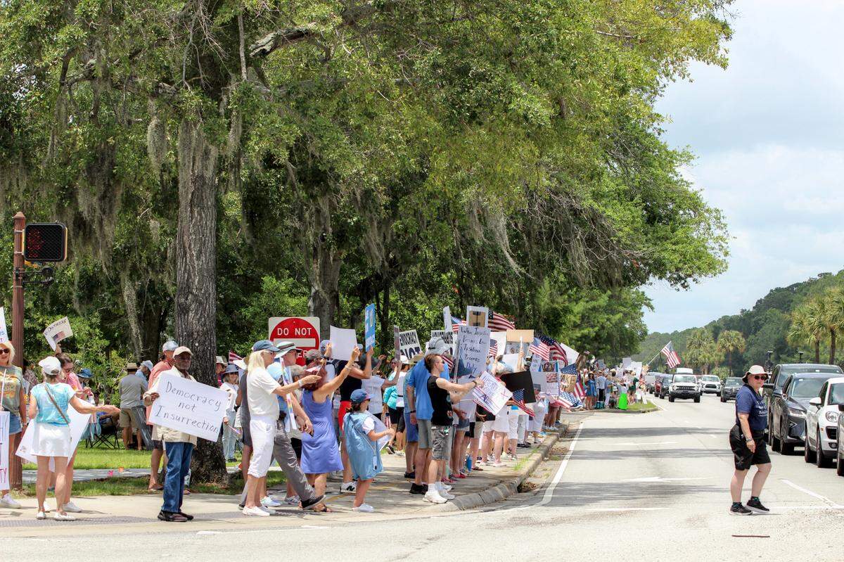 Crowds of anti-Trump protesters gathered at the intersection of Matthews Drive and William Hilton Parkway on June 14, 2025. Many cited recent mass deportations as a point of concern, which they argue are being done without due process.