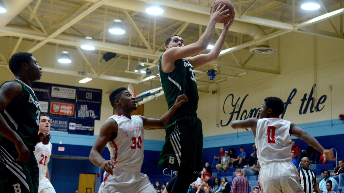 Beaufort?s Matt Garay, second from right, jumps with the ball during their game against Hazel Green High School on Tuesday afternoon at Hilton Head Island High School.