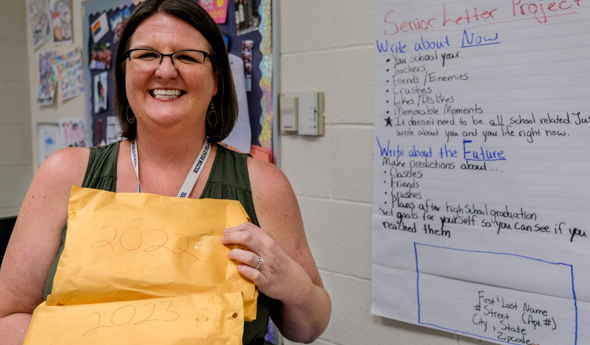Patricia Drane, an eighth grade teacher at Hilton Head Island Middle School, holds the letters her students have written to themselves on Monday, June 14, 2021.