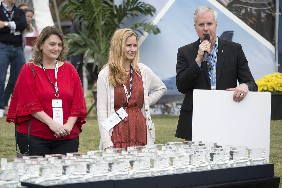 A scholarship program in partnership between the Hilton Head Island Concours d’Elegance, Michelin and the Beaufort County School District was awarded to Hilton Head Island High School student Lily Tothero, center, as the overall winner for the 2nd Annual Michelin Junior Challenge Design.