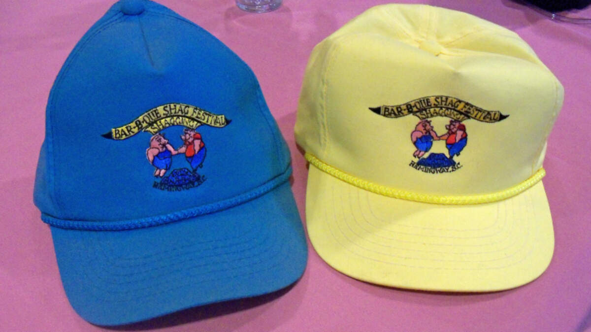 Two souvenir caps hold wonderful memories from the Bar-B-Que Shag Festival in Hemingway, South Carolina.