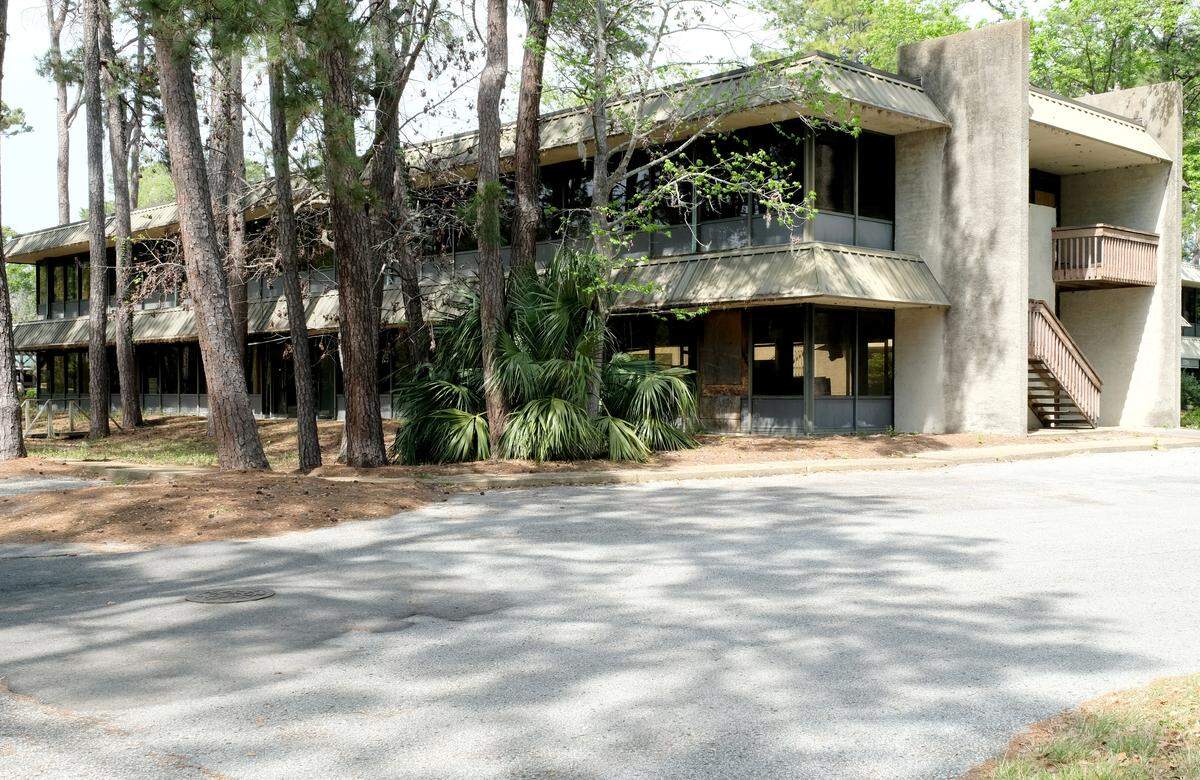 An abandoned office building located at 120 Office Way on Hilton Head Island.
