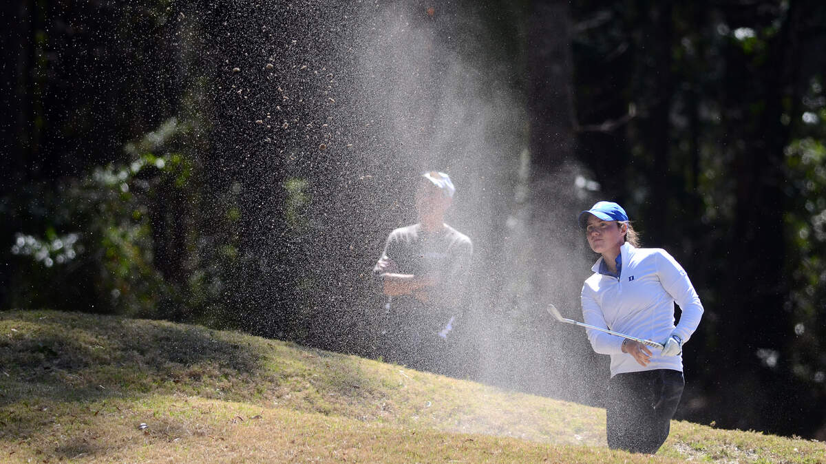 Duke's Leona Maguire looks to see where her ball lands after hitting the ball out of a bunker on the fairway at No. 11 during the 4th Annual Darius Rucker Intercollegiate at Long Cove Club final round on Sunday afternoon on Hilton Head Island.