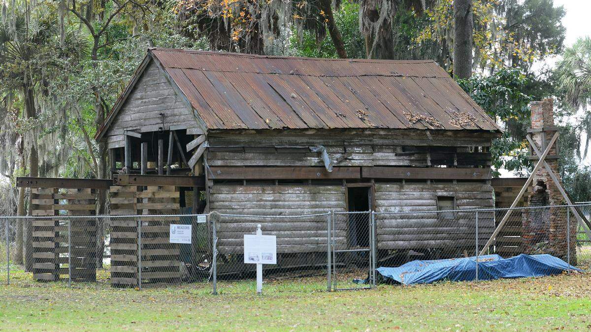 Bluffon's historic Garvin house -- a former post-civil War freedman's home -- is photographed Dec. 18, 2015, at Oyster Factory Park. Restoration plans include reconstructing an enclosed porch addition on the side of the main house that will attach to the exposed chimney stack located at far right.