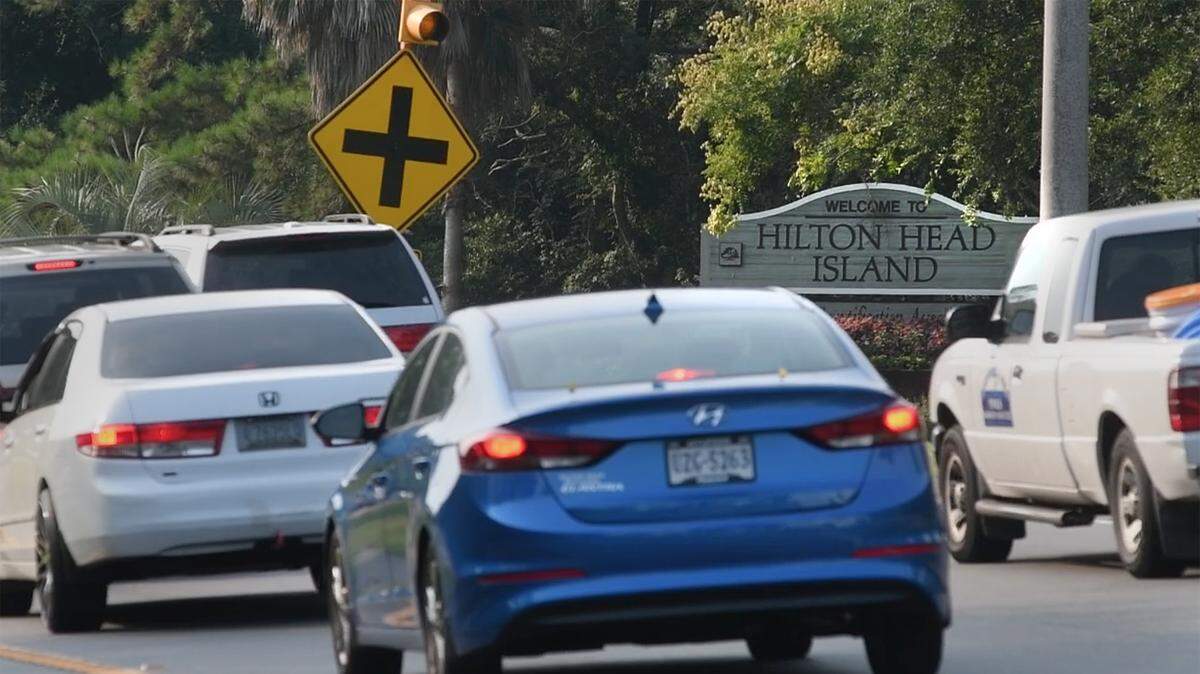 The “Welcome to Hilton Head Island” sign on William Hilton Parkway at the base of the bridges to the island. Authorities say a fallen tree is resulting in traffic being diverted at Whooping Crane Way.