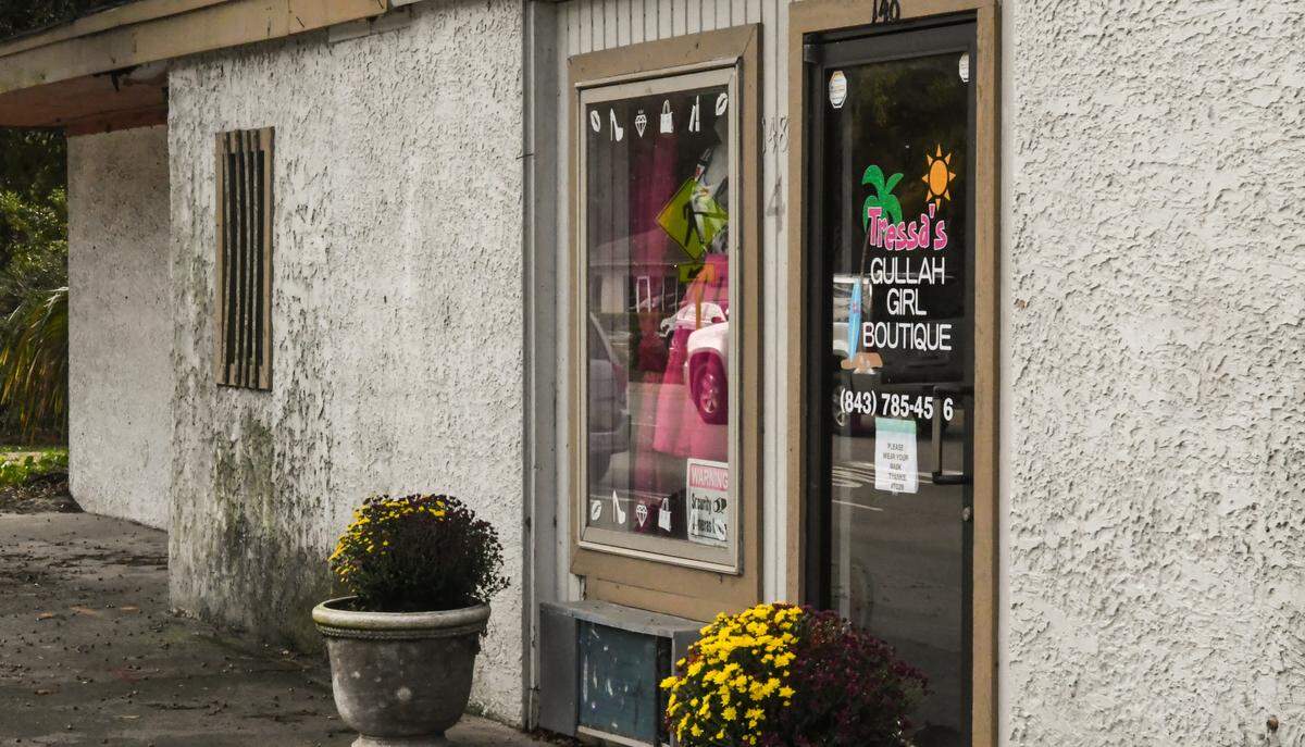 Traffic from U.S. 278 is reflected in the door and window of Tressa’s Gullah Girl Boutique as seen on Thursday, Oct. 22, 2020 on Hilton Head Island. The business owned by Tressa Govan, is about 20 feet from the four-lane highway and is at risk of being in the path of S.C. Department of Transportation’s plan to widen the highway with another two lanes.