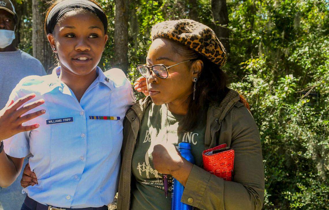 Topaz Williams Fripp, left, recounts the lockdown at Beaufort High School after a report of an active shooter on Wed., Oct. 5, 2022 as her mother Ivory Williams holds her and listens.