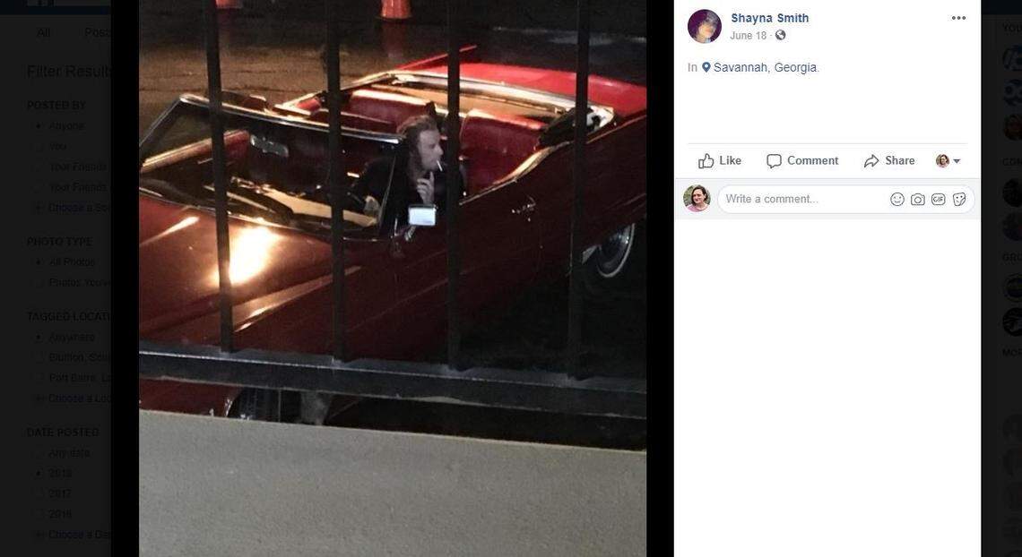 John Travolta is seen driving a deep red vintage Cadillac deVille convertible on the set of "The Poison Rose" in Savannah, Georgia, on Monday, June 18, 2018.