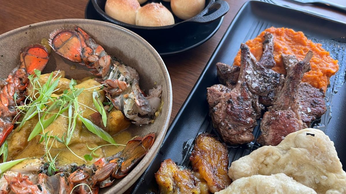Clockwise from left: Cashew curry served with lobster, coco bread, jerk goat and bara are on the menu at Okan in Old Town Bluffton.