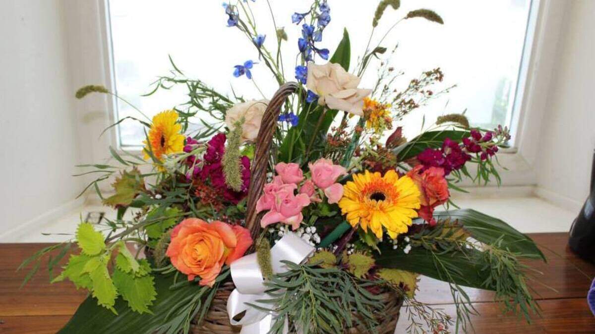 Pictured is a flower arrangement from Bitty's Flower Shop in Beaufort. The nearly 60-year-old flower shop recently reopened after being closed for renovations this summer.