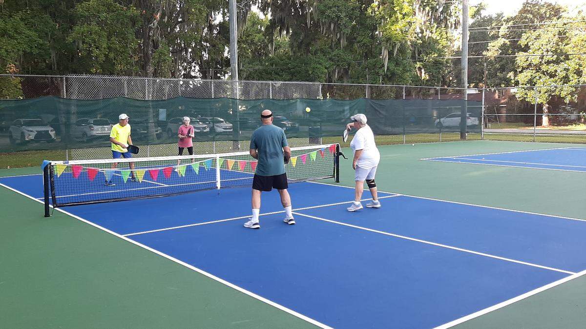 Pickleball players at a public court in Beaufort, SC.
