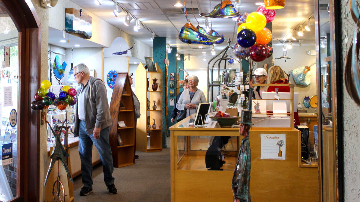 Curious patrons walk through Nash Gallery in Shelter Cove Harbour & Marina on Hilton Head Island on Nov. 12, 2025. The local gallery has sold American-made jewelry, ceramics and artwork for over 36 years.
