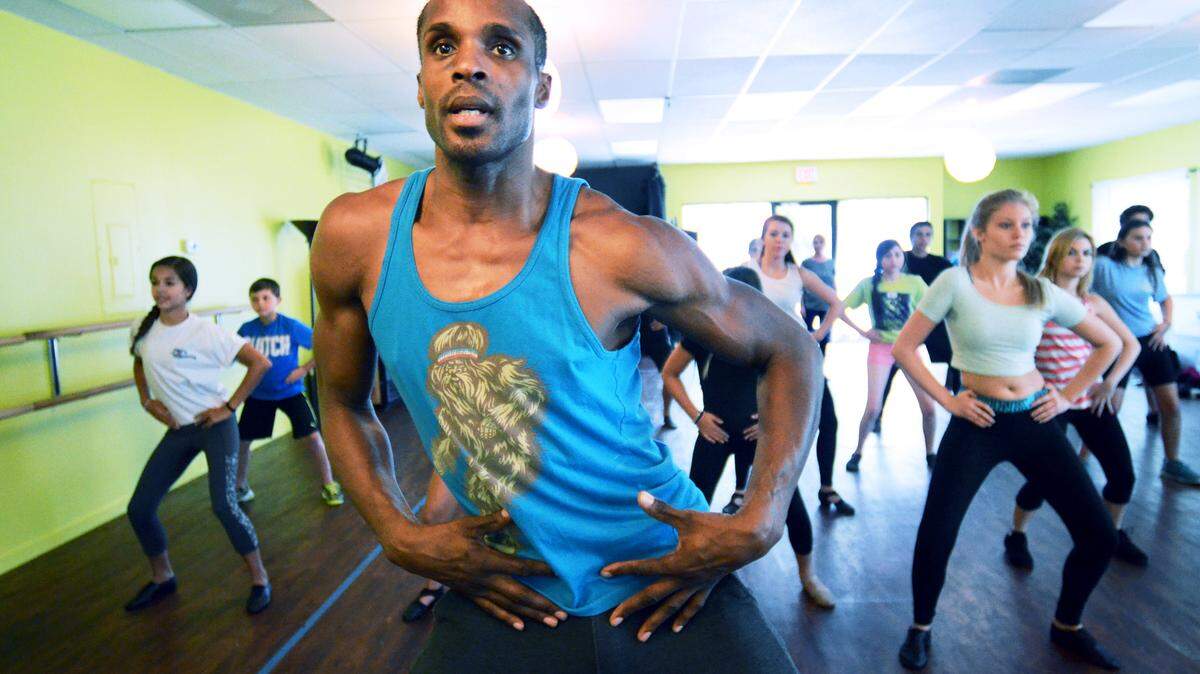 Choreographer Dante Henderson leads a group of students during Don Hite's Broadway Carolina Youth Centre Stage camp on Tuesday at Move and Motion Studios on Hilton Head Island.