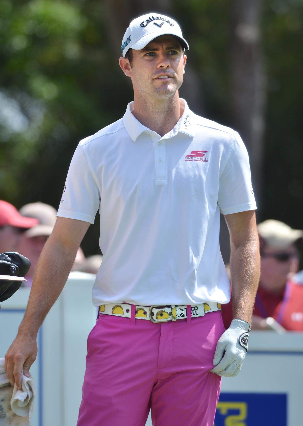 Defending champion Wesley Bryan waits to tee off on No. 9 during Friday's second round of the RBC Heritage Presented by Boeing golf tournament at Harbour Town Golf Links on Hilton Head Island. He is seen here wearing a belt provided by his sponsor, Taco Bell.