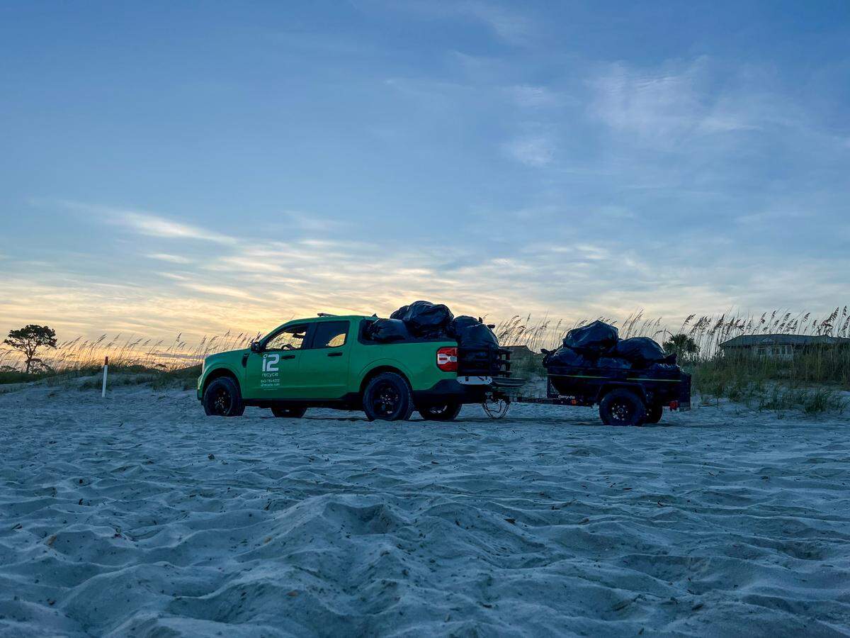 Workers with i2recycle collect recyclables on July 5, 2024 from the bins on Hilton Head Island beaches that will be recycled at the company’s facility located in Hardeeville Business Park in Hardeeville, S.C.