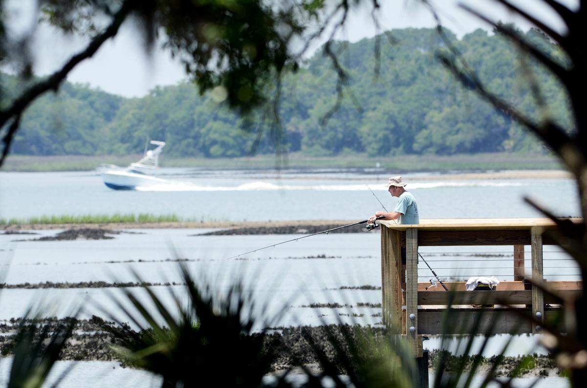 Hilton Head Islander Tom Derry said he was enjoying the scenery while trying his luck fishing the waters of Skull Creek from the dock of the Rowing and Sailing Center at Squire Pope Community Park on Tuesday. “It’s a beautiful park” he said. Though he had yet to reel in a fish, Derry said he was fishing for anything that bites, but was hoping to hook a redfish. “I’ve caught a lot of redfish here,” he said, “mostly in January and February.”