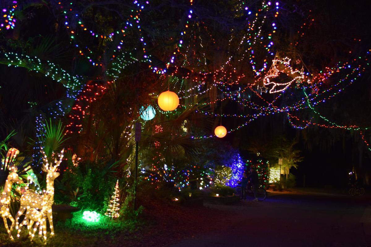 Lights and glowing orbs are draped above Dove Street on Hilton Head Island.