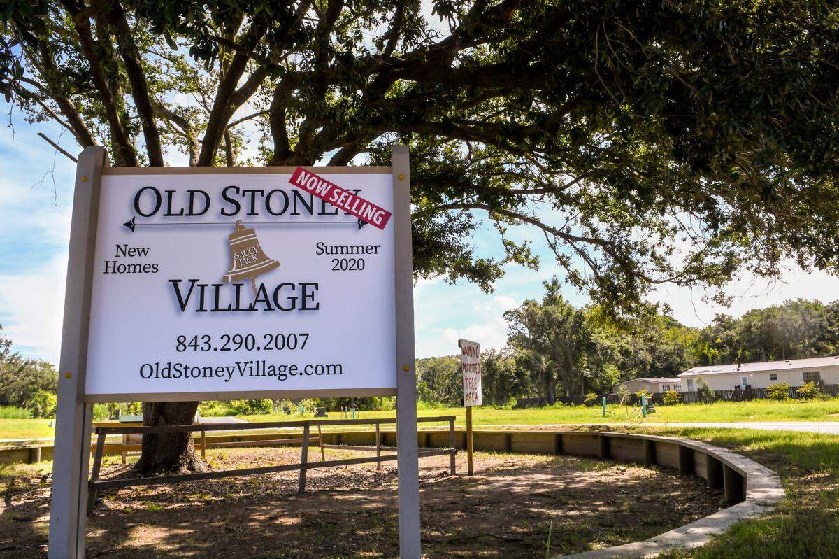 Pictured on Friday, Aug. 14, 2020, is Old Stoney Village, a new housing development located off Squire Pope Road on the north end of Hilton Head Island, which has begun selling townhomes that will cost between $300,000 and $350,000. Two plans for the U.S. 278 Corridor Project could place a six-lane highway at the back of the property.
