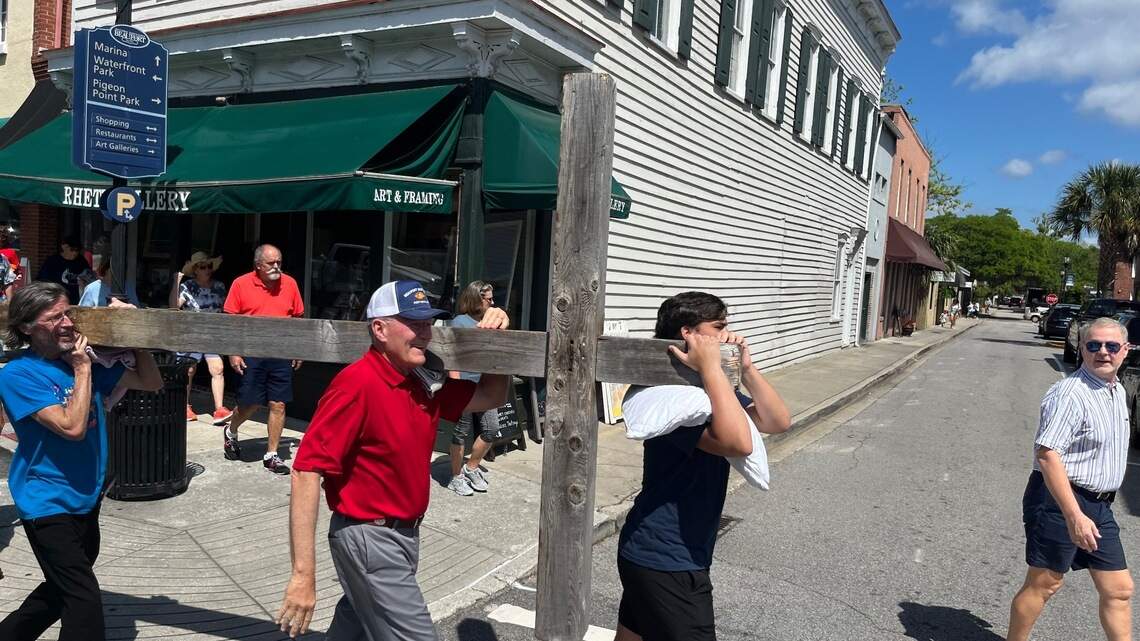 Church members take turns carrying cross across Beaufort. ‘I can’t imagine him doing it’