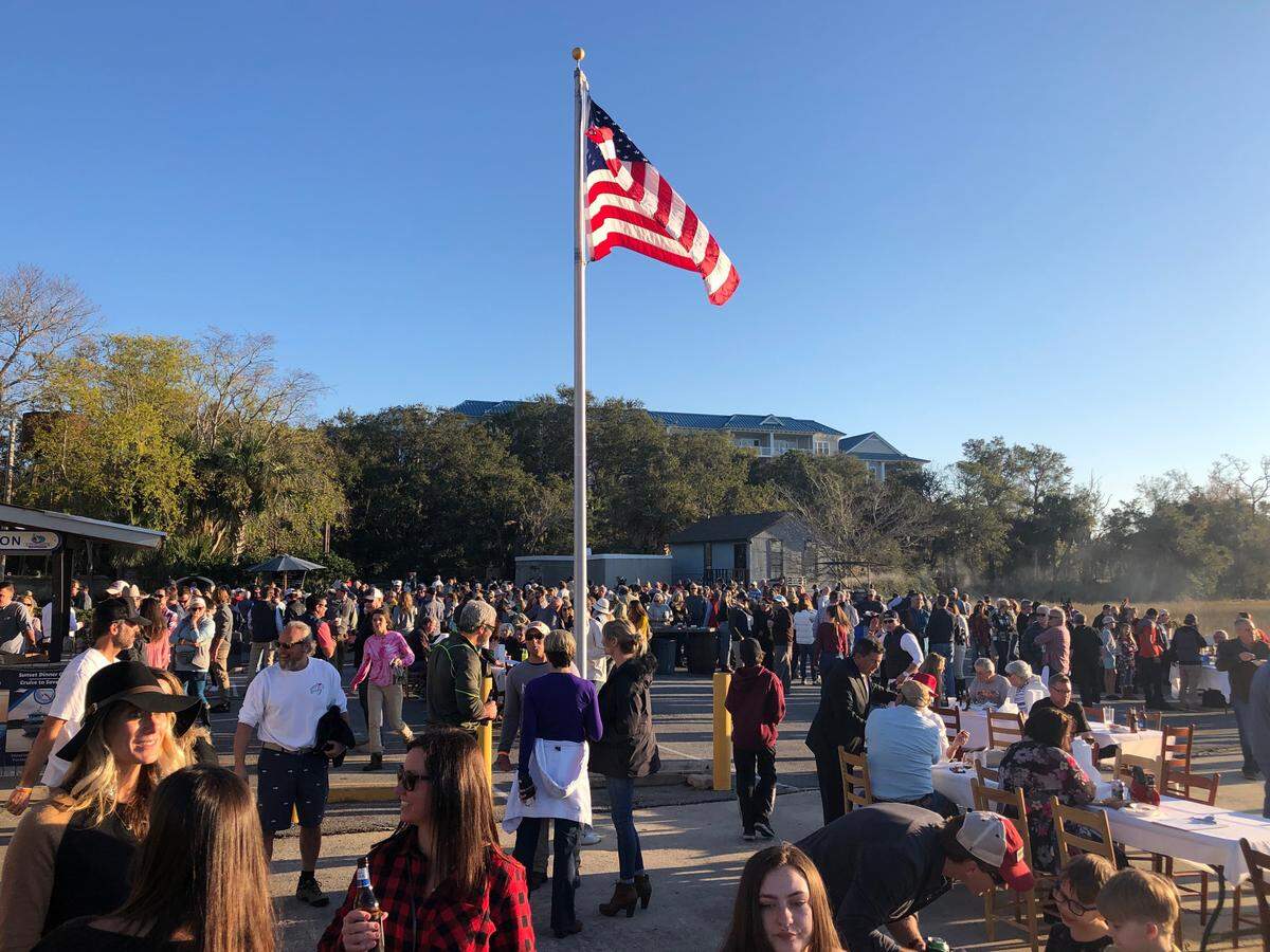 Nearly 1,000 people gathered Dec. 15 to support Michael Perry, a charter fishing captain who fell from his tree stand in November and was impaled by a tree. Perry is still in the hospital in Tennessee.