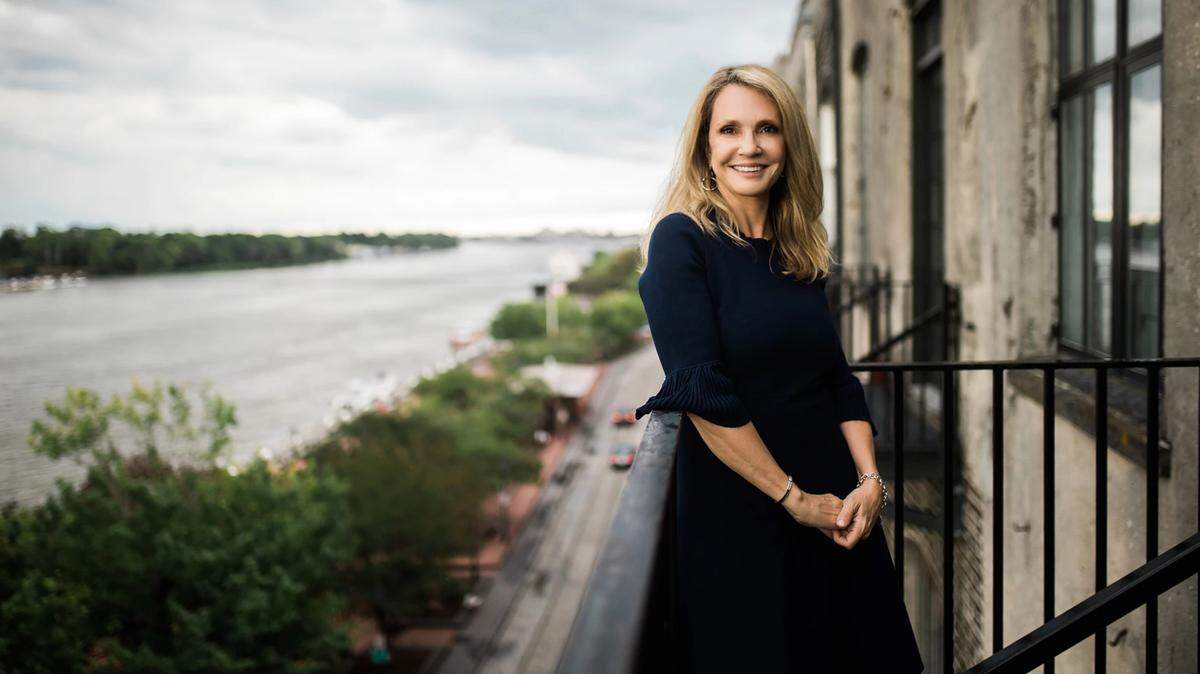 Pictured on a balcony above Savannah, Georgia’s historic riverfront is Patti Callahan, author of the soon to be released “Surviving Savannah,” a historical fiction novel based on the true story of the Steamship Pulaski wreck.