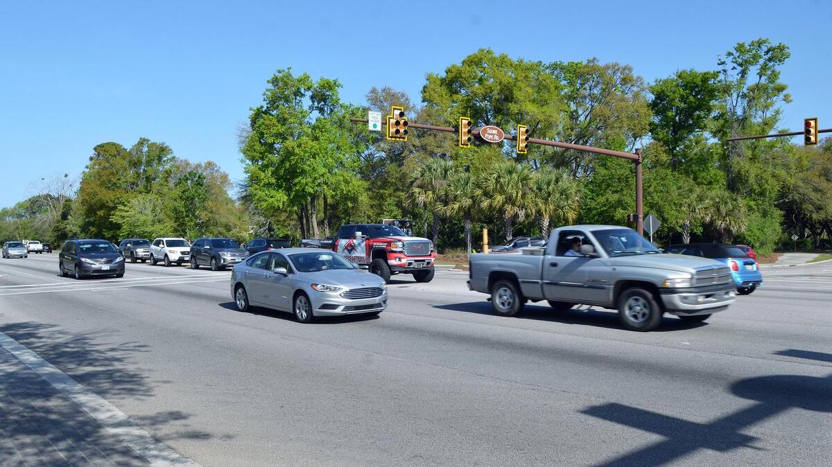 Vehicles roar down William Hilton Parkway through its intersection with Squire Pope Road on Friday. The intersection is the third most likely spot for a collision on Hilton Head Island.