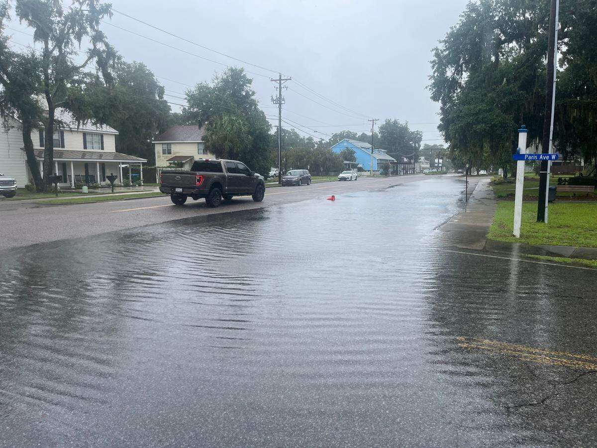 Flooding on Paris Avenue, the street that cuts through the heart of Port Royal, South Carolina, on Tuesday, Aug. 6, 2024.