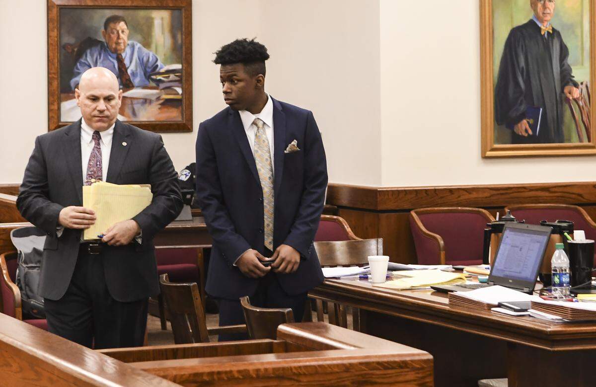 John Ira Duncan III, right, walks into the courtroom on Wednesday afternoon with his public defender, Jeffrey Stephens, as they prepared for Duncan to take the stand in his trial for which he is charged with the murder of Dominique Williams, 16, in July 19, 2015 on Hllton Head Island.