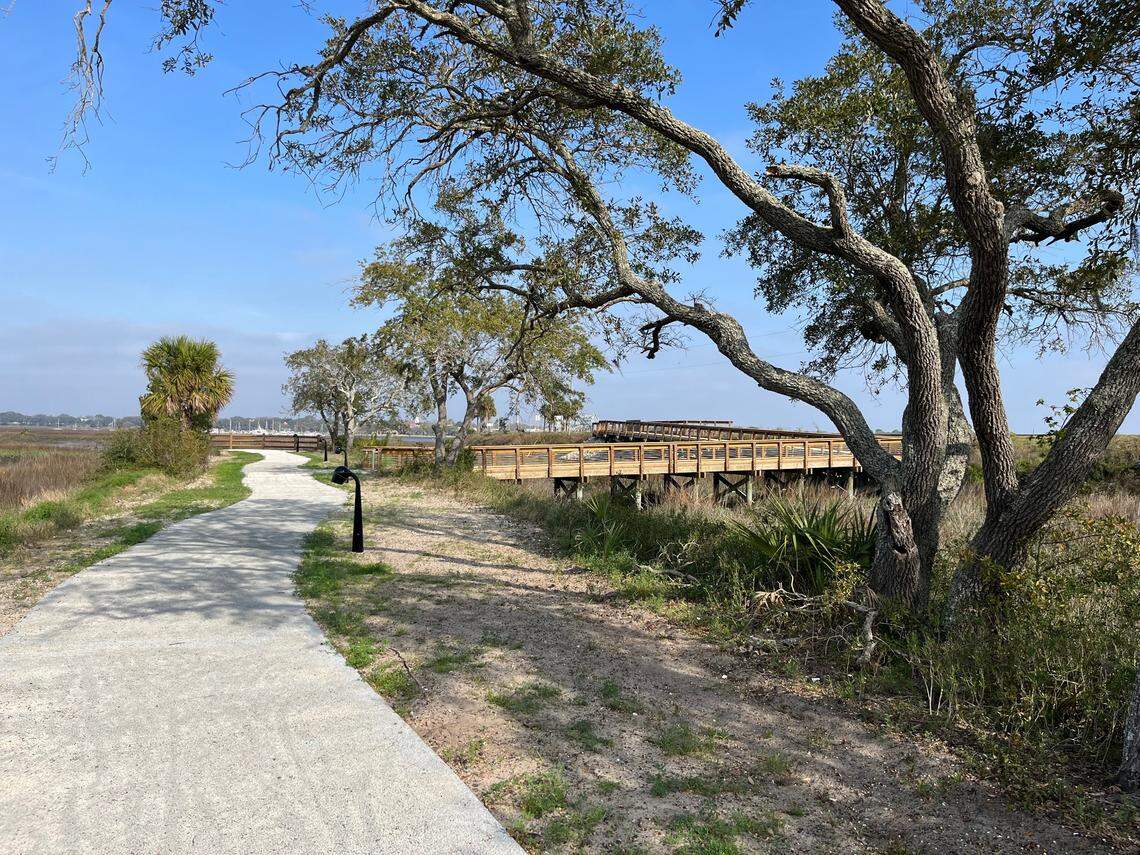 A lighted multi-purpose trail leads to a viewing platform near the Beaufort River. To the right, a boardwalk connects Highway 21 with the multi-purpose trail.