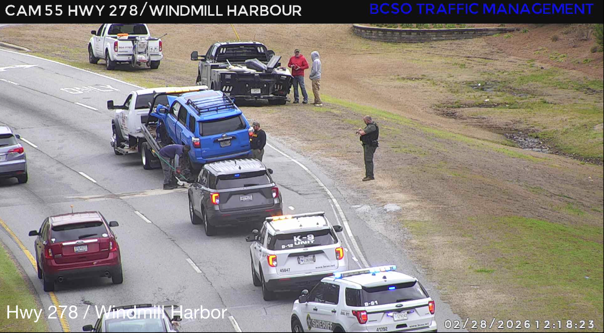 A blue Toyota 4Runner was loaded onto a tow truck following a crash near the entrance to Hilton Head Island’s Windmill Harbor around noon on Feb. 28, 2026. Crews’ response temporarily blocked the right eastbound lane of William Hilton Parkway.