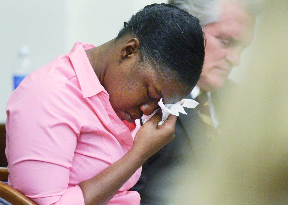 FILE: Shayla Bryan, accused of the attempted murder of her daughter in December 2011, begins to weep as a videotape of her interrogation by the Beaufort Police Department is played during her trial May 20, 2014, at the Beaufort County Courthouse. Next to her is defense attorney Russell Keep.
