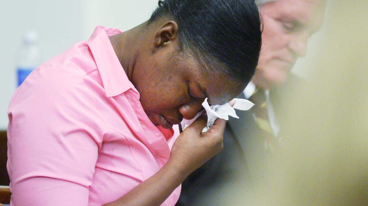 FILE: Shayla Bryan, accused of the attempted murder of her daughter in December 2011, begins to weep as a videotape of her interrogation by the Beaufort Police Department is played during her trial May 20, 2014, at the Beaufort County Courthouse. Next to her is defense attorney Russell Keep.