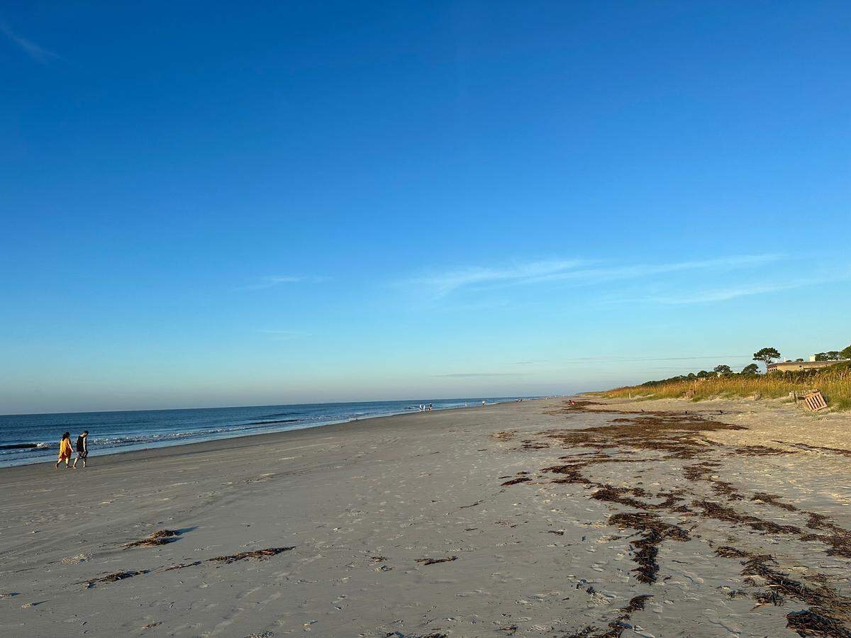 Scattered groups of tourists dotted Hilton Head’s Coligny Beach as early as 7 a.m. Thursday, following an evening of heavy wind and rain as Tropical Storm Idalia moved through South Carolina.