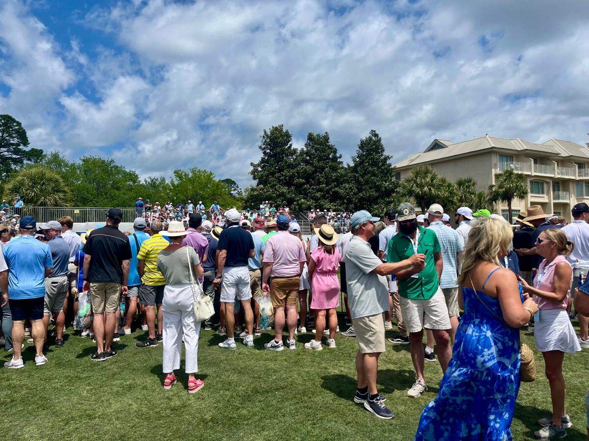Spectators gathered around the first hole to watch Justin Thomas tee off on Friday, April 18, 2025