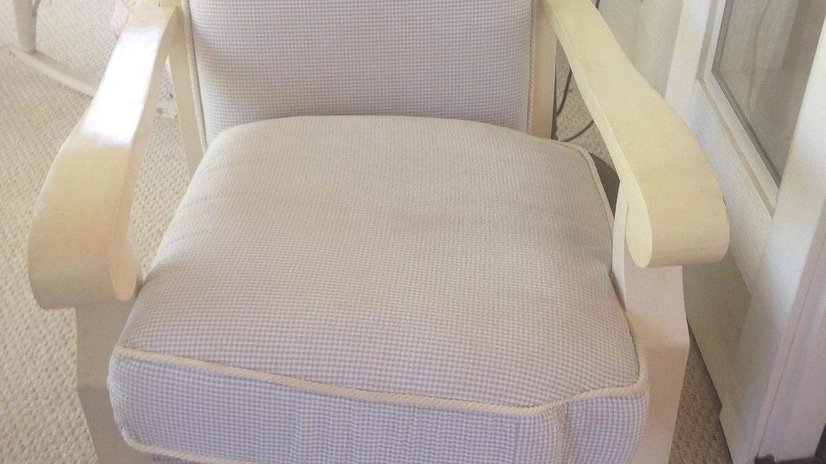BEFORE: Judi Kirby found this chair at a thrift store. It had "good bones," she said, so she brought it home for a makeover.