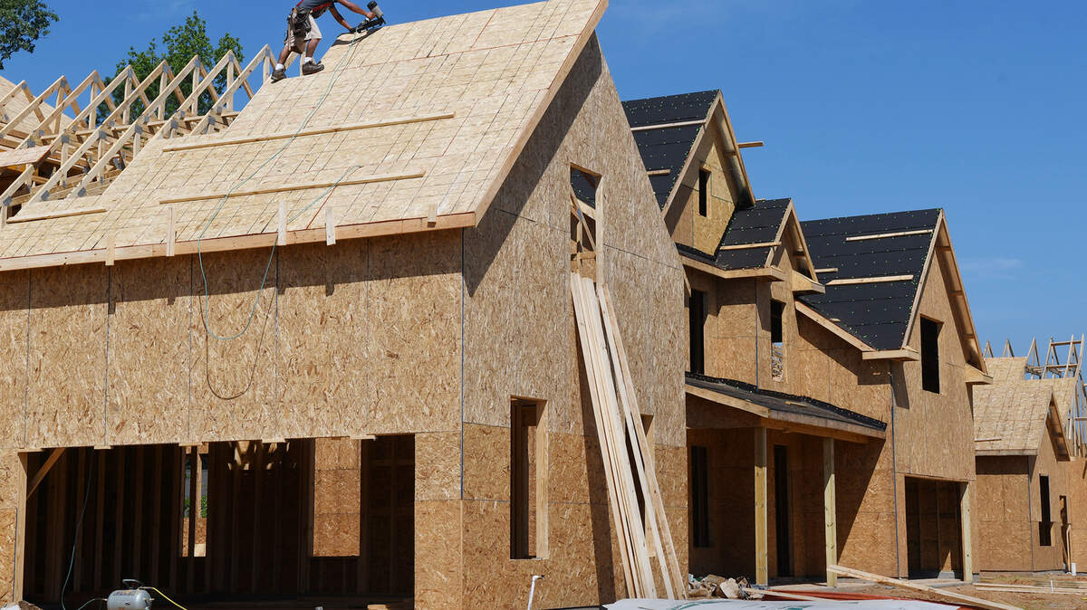 A new residential unit goes up on Hulston Landing Road in the Cypress Ridge development off of Okatie Highway in Bluffton on Friday.