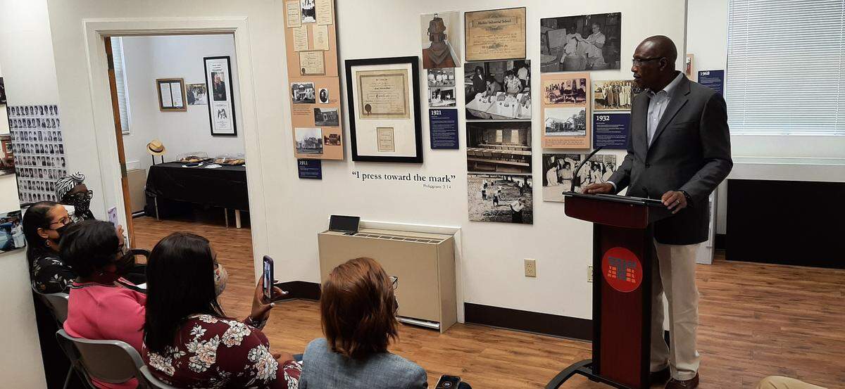 Mitch Mitchell, a member of the Beaufort City Council, speaks during an event honoring civil rights activist Frieda Mitchell at the Techinical College of the Low Country. Frieda Mitchell encouraged him to put his education to use serving his home town.