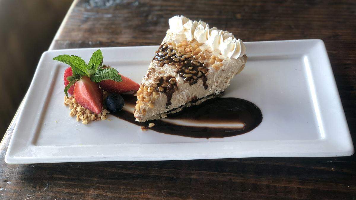 A slice of Bessie’s Peanut Butter Pie is shown at Hudson’s Seafood House on the Docks.