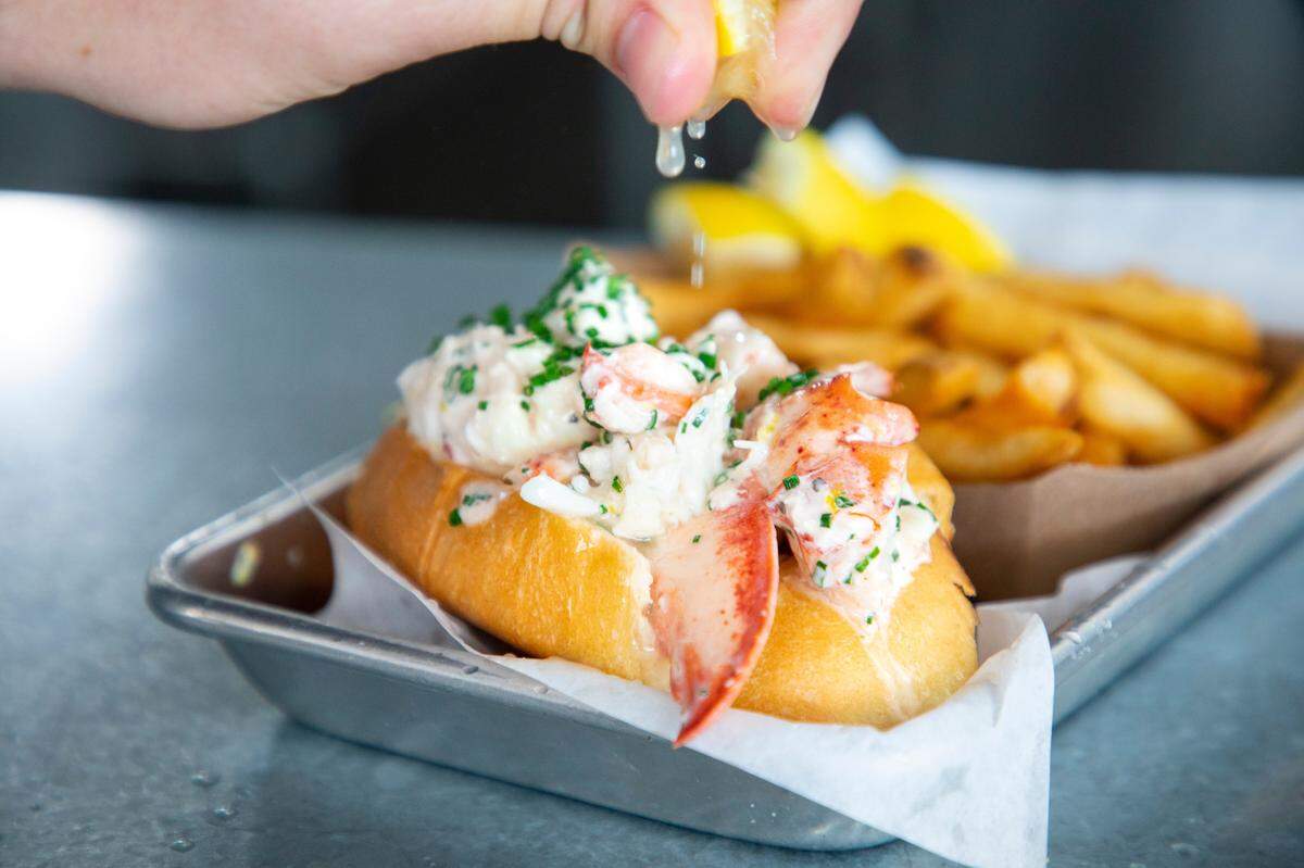 One of Slapfish’s specialties is a traditional lobster roll.