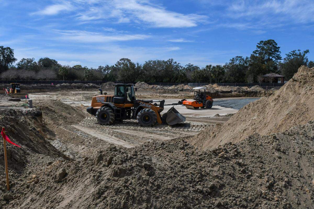 A bulldozer, land mover and a compaction roller sit idle in the area that will add 1,400 pre-placed concrete crypt gravesites for casketed burials on Monday, March 3, 2025 at Beaufort National Cemetery in Beaufort. The expansion project also includes 1,400 in-ground sites for cremated remains and a 2,500-niche columbarium plaza in the northeast corner of the cemetery.
