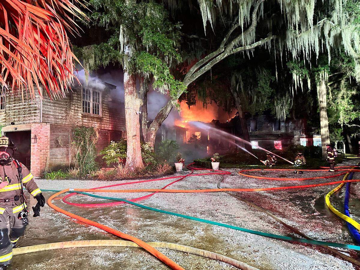 Bluffton firefighters used multiple water hoses to control a large Tuesday evening house fire on Bridge Street. The 1800s-era home was destroyed, but all occupants were able to escape safely.