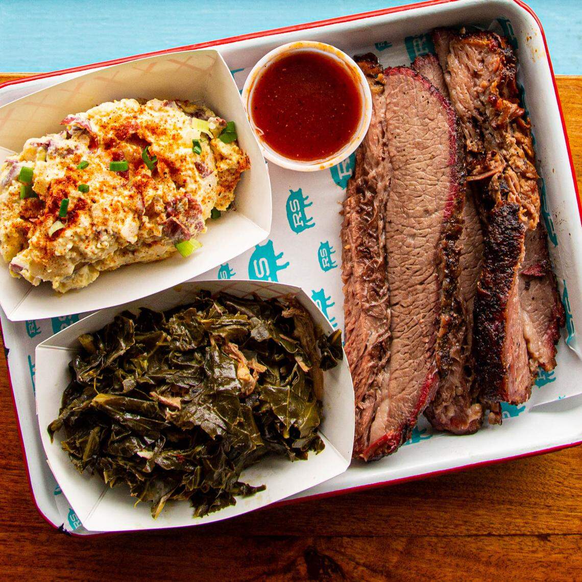 Rodney Scott’s brisket and sides, which can be found at Rodney Scott’s Whole Hog BBQ in Charleston.