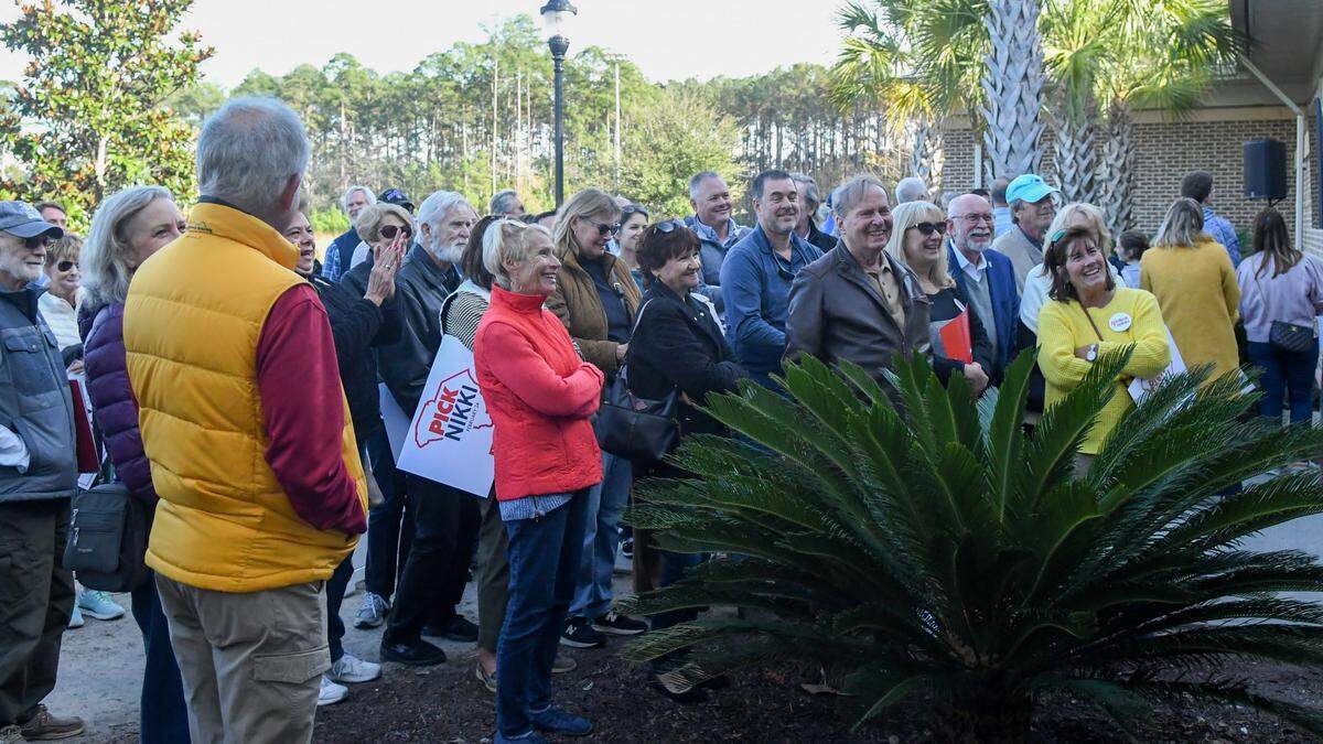 A group of about 100 watch a live feed outside and laugh when former U.S. Ambassador and S.C. Gov. Nikki Haley’s says Congress and the Senate resemble a geriatric ward after announcing she’d enact term limits during her 2024 Presidential Town Hall at USCB’s Sand Shark Recreation Center on Monday, Nov. 27, 2023 in Bluffton.