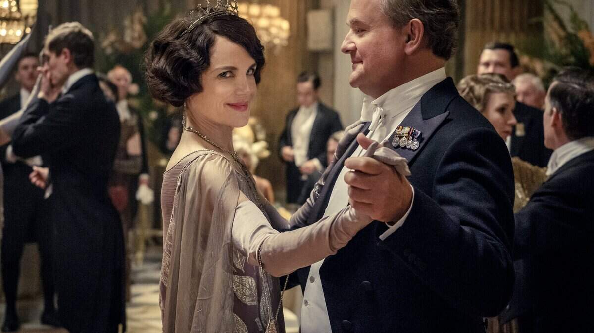 This image released by Focus Features shows Elizabeth McGovern, left, as Lady Grantham and Hugh Bonneville, as Lord Grantham, in “Downton Abbey.” The highly-anticipated film is a continuation of the “Masterpiece” series that wowed audiences for six seasons.