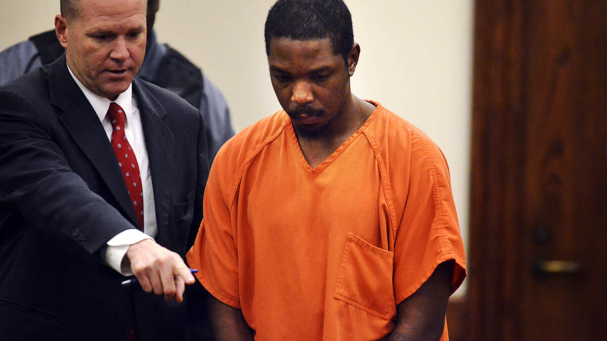 Kalvin Hunt, right, is escorted through the Beaufort County Courthouse on Dec. 18, 2014. Hunt was ruled not guilty by reason of insanity in the death of a pedestrian he struck while driving a stolen Port Royal firetruck in February 2012.