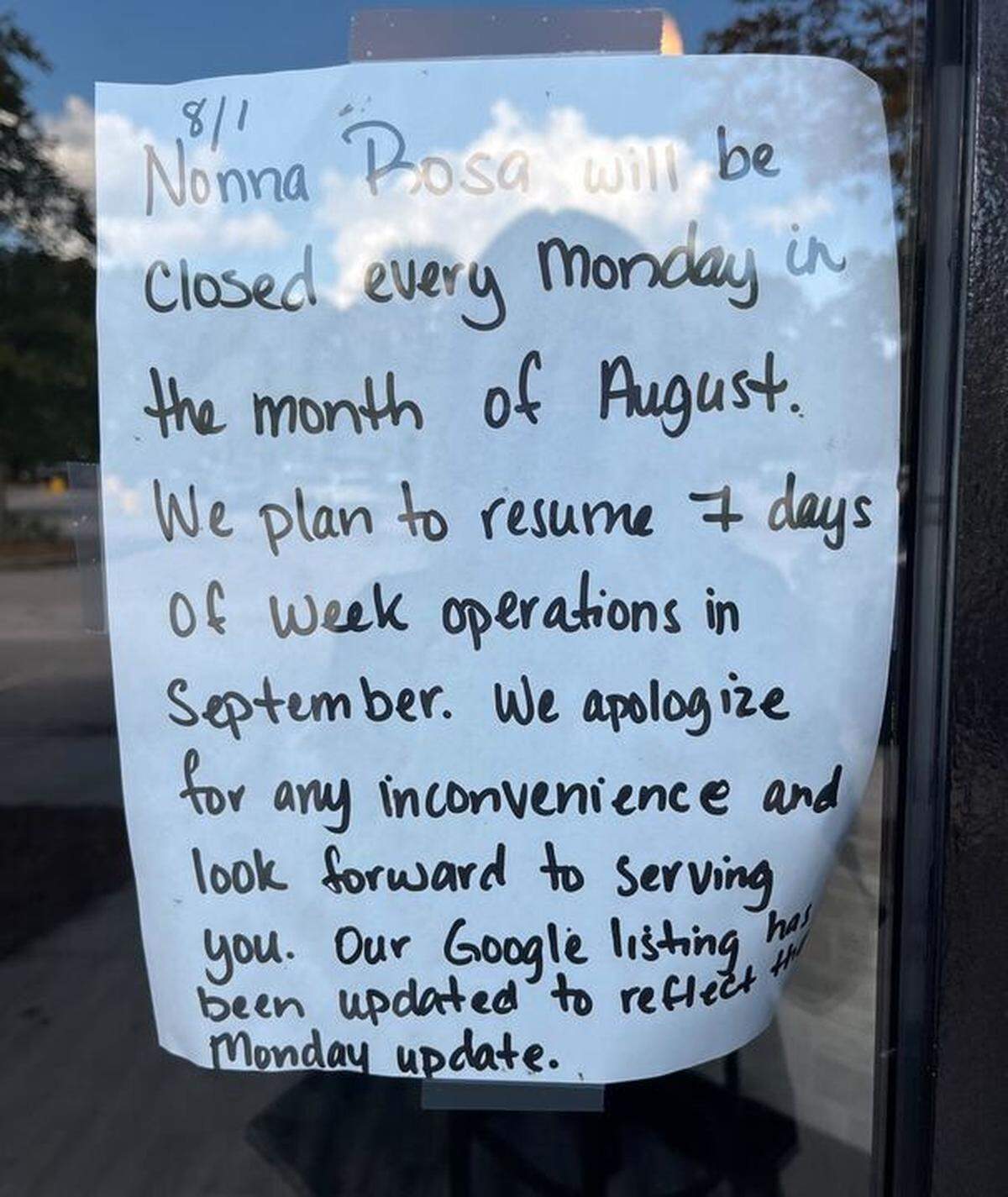 Hours and updates provided on the front door of Nonna Rosa as new ownership takes over.