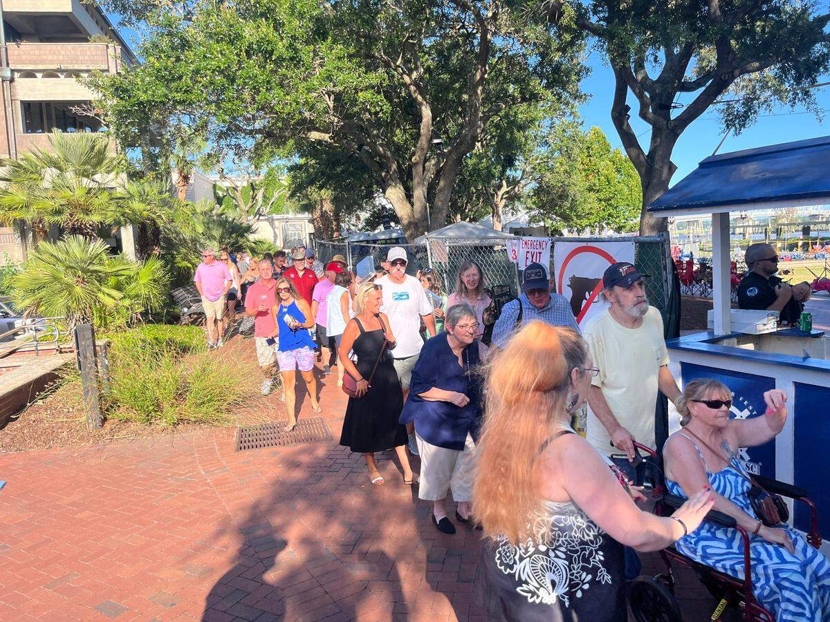 Residents waited in a long line to get into the Lowcountry Supper featuring Frogmore stew during the Beaufort Water Festival Thursday.