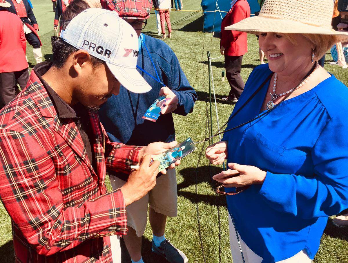 2018 champion Satoshi Kodaira signs autograph for a fan following the opening ceremonies for the 51st RBC Heritage Presented by Boeing on Monday, April 15, 2019, at the Harbour Town Golf Links in Sea Pines on Hilton Head Island.