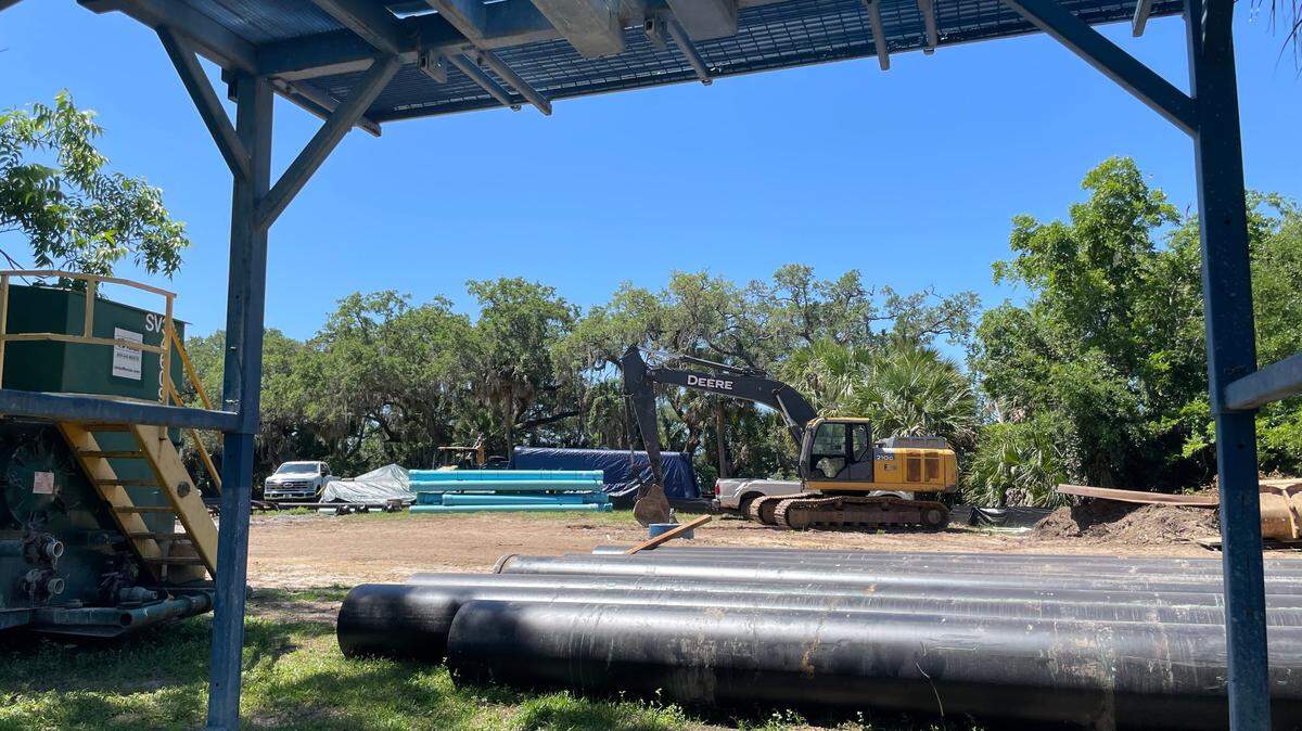 Stacks of pipes lie at a construction site near the Crazy Crab on May 22, 2025. The blue piping will carry water pumped from 600 feet under Hilton Head towards a treatment plant as part of a project to add 2 million gallons of water per day to the island’s water supply.