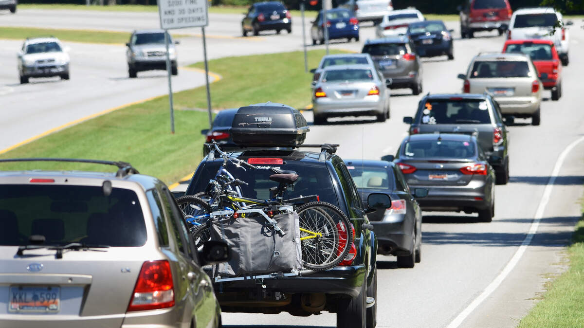 Island-bound traffic enters the city limits of Hilton Head Island at the base of the J. Wilton Graves Bridge on Thursday. Memorial Day weekend marks the start of high summer family vacation season.